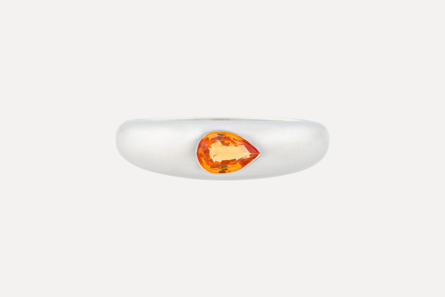 Orange sapphire waterdrop dome ring made in sterling silver with rhodium plating for a dazzling finish.