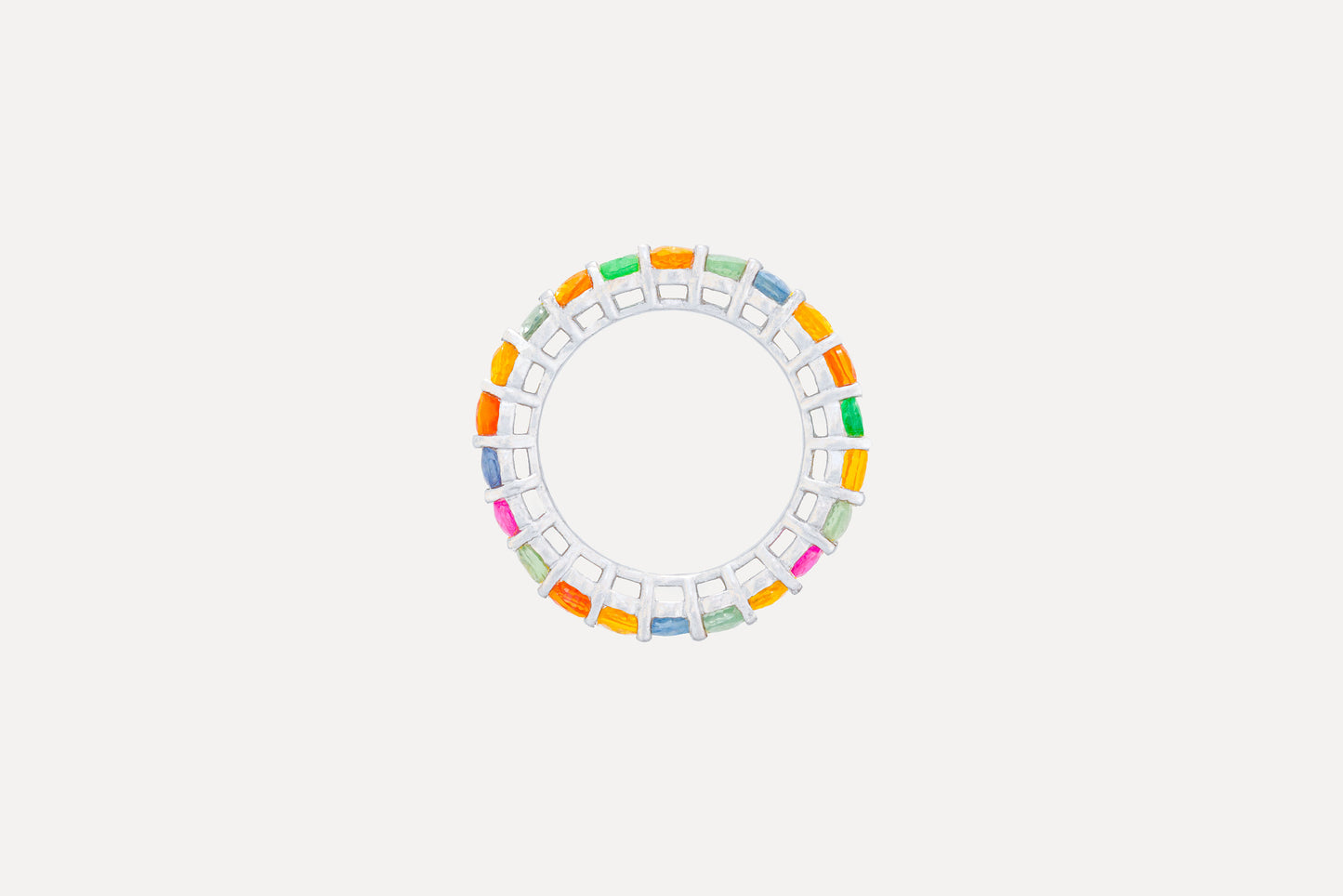 Multi coloured sapphire eternity ring in sterling silver with a shiny rhodium plating.
