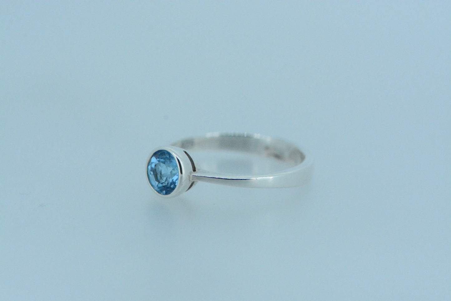 Round Blue Topaz Solitaire Ring