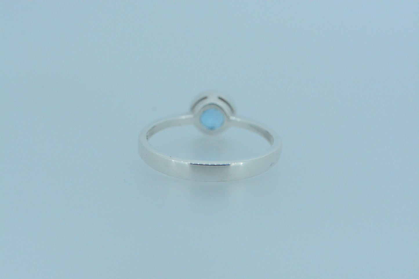 Round Blue Topaz Solitaire Ring