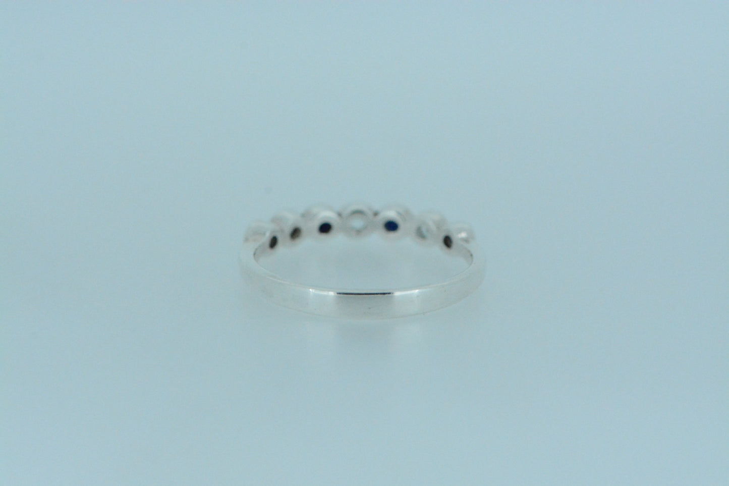 Round Cut Sapphire and Blue Topaz Ring