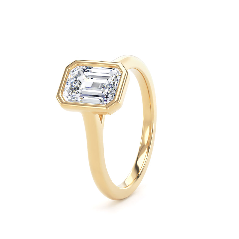 Emerald Cut Bezel Set Diamond Solitaire Ring In 18K Solid Gold