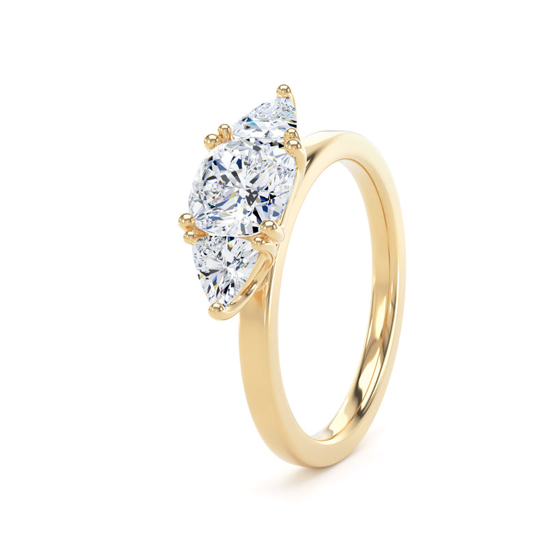 A yellow gold ring featuring a marquise-cut diamond cluster setting on a clean white background.