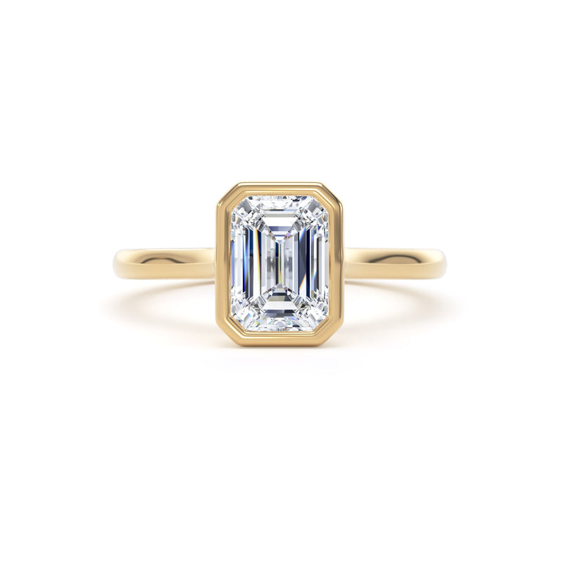 Emerald Cut Bezel Set Diamond Solitaire Ring In 18K Solid Gold