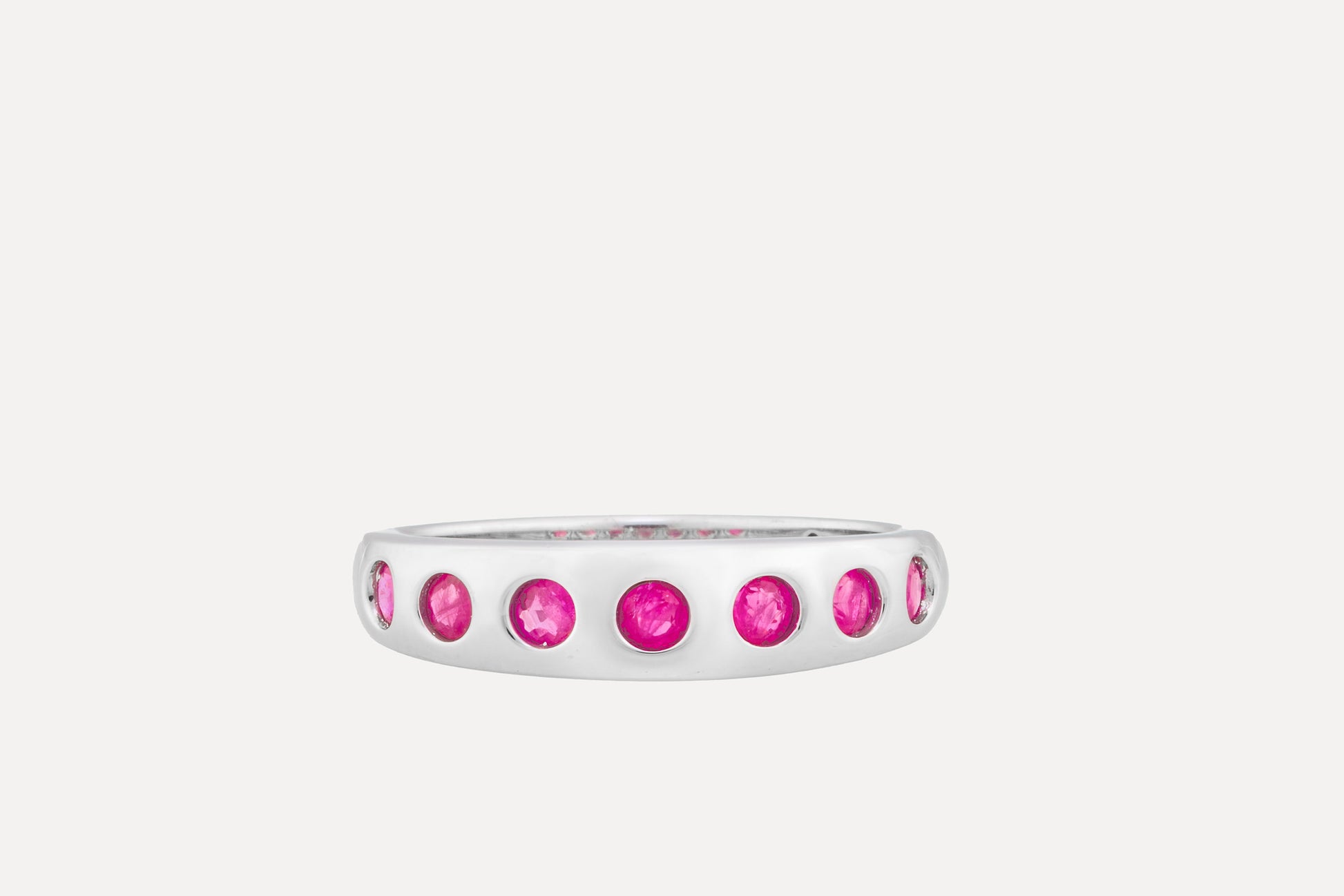 Ruby half eternity ring in sterling silver with rhodium plating