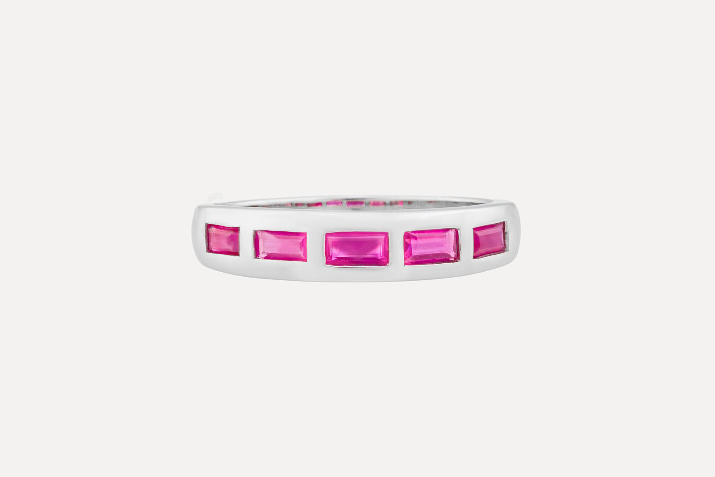 Ruby half eternity ring in sterling silver with rhodium plating