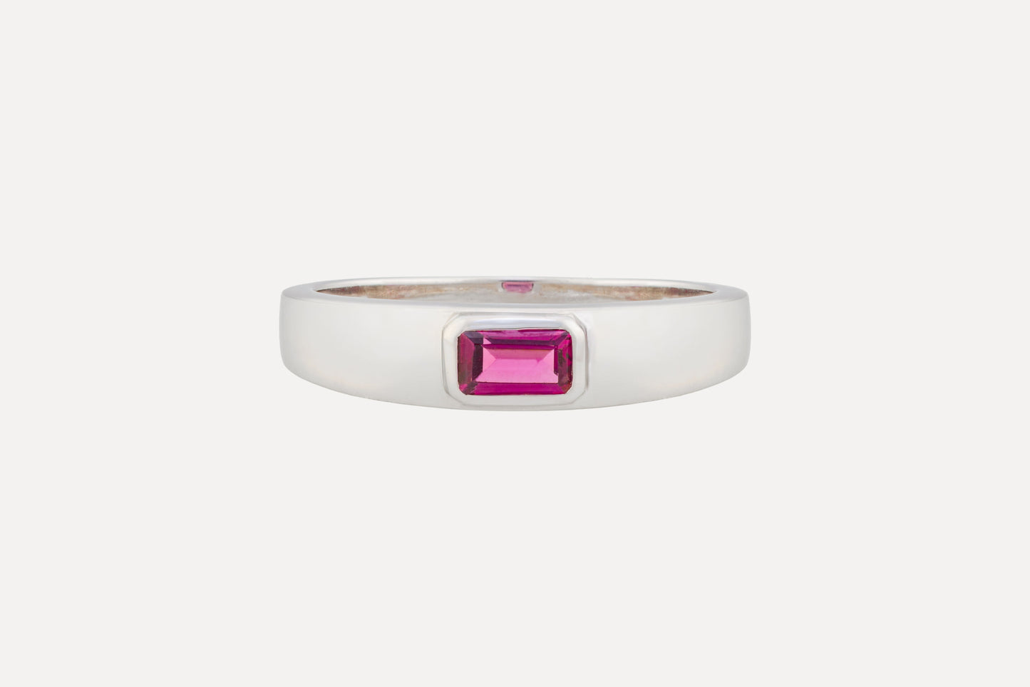 Rhodolite solitaire ring in sterling silver with rhodium plating