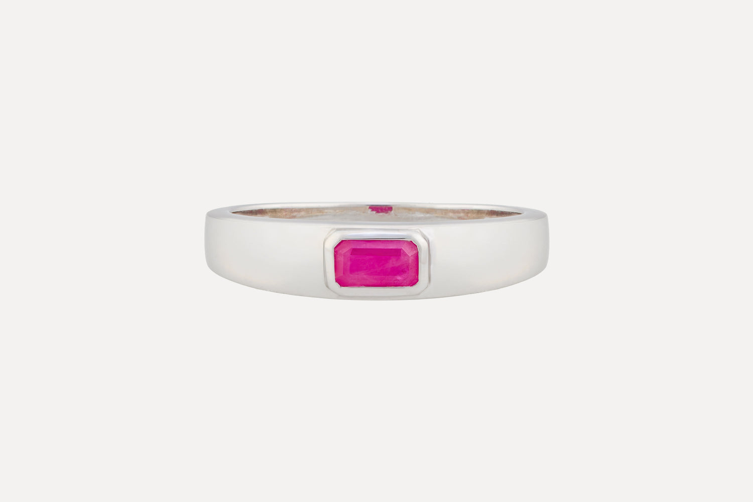 Ruby solitaire ring in sterling silver with rhodium plating.
