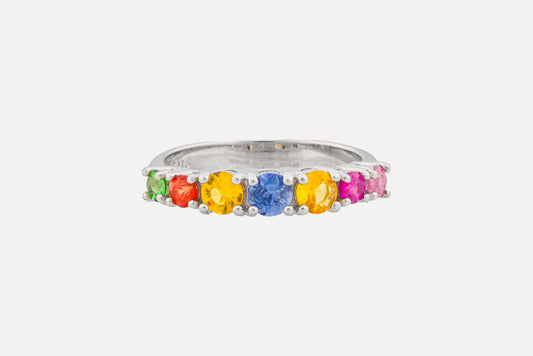 Multi coloured sapphire half circle eternity band ring set in sterling silver with rhodium plating.