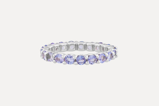 Crafted in sterling silver with a full circle of round cut tanzanite stones in a claw setting. Plated with rhodium for a dazzling finish.

These mesmerizingly beautiful tanzanite stones have come from the Merelani foothills of Kilimanjaro.