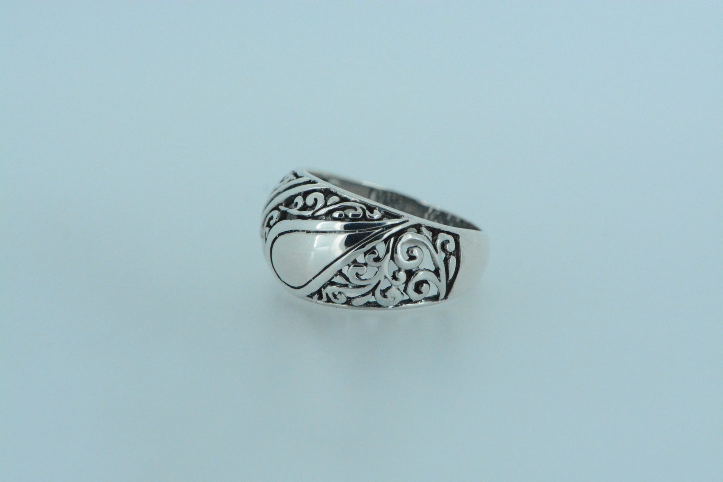 Domed Design With Waterdrop and Swirls Ring