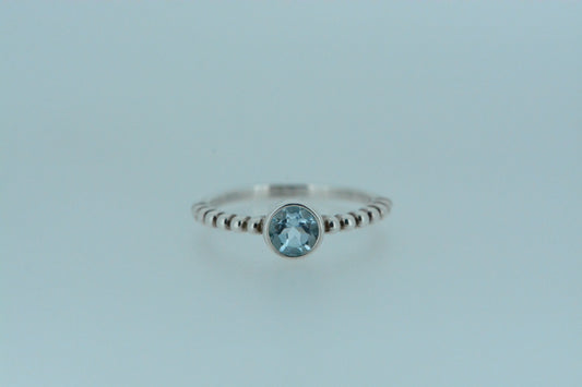 Blue Topaz Circle Solitaire Ring