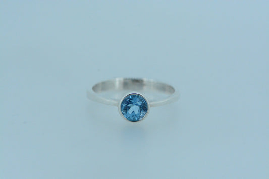 Blue Topaz Circle Solitaire Silver Ring